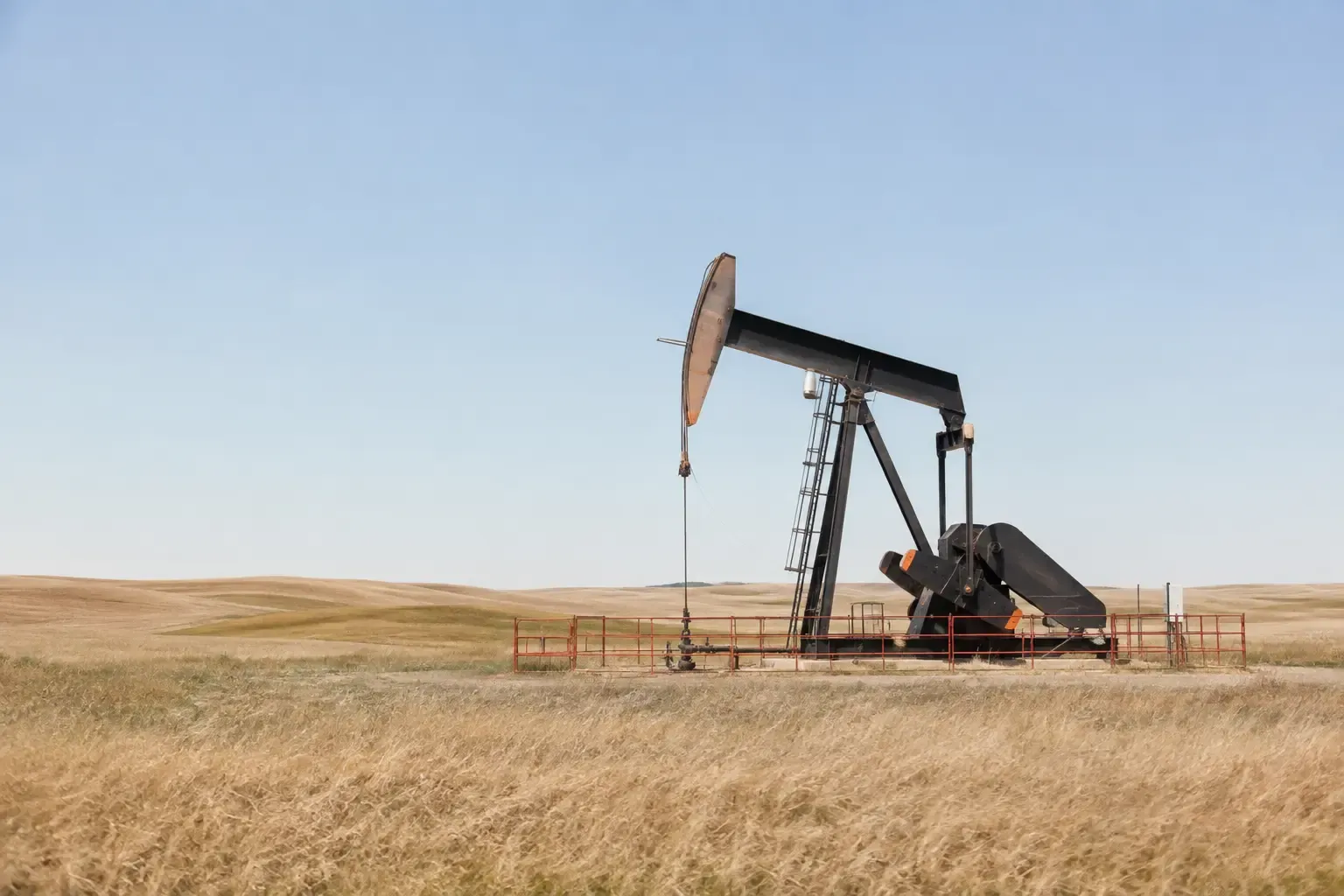 Oil well pumpjack on western Nebraska rangeland